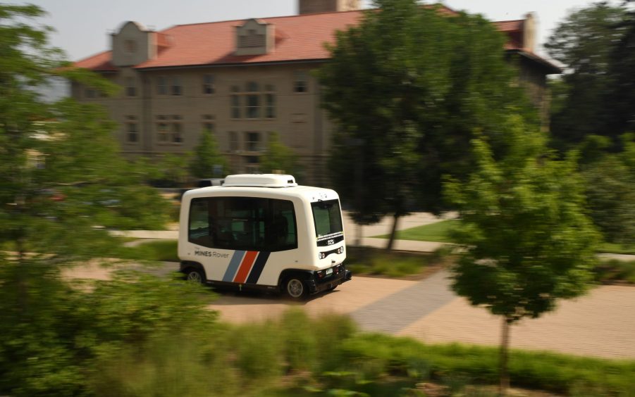 A white Mines Rover on campus at the Colorado School of Mines