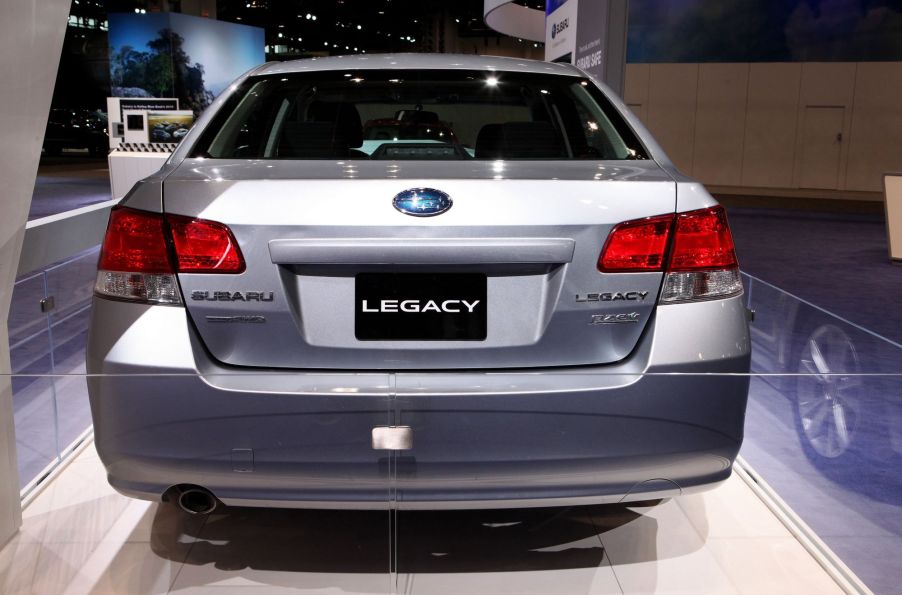 A damaged Subaru Legacy sedan model featured at the 109th Annual Chicago Auto Show