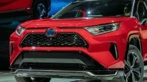 A red Toyota RAV4 Hybrid.