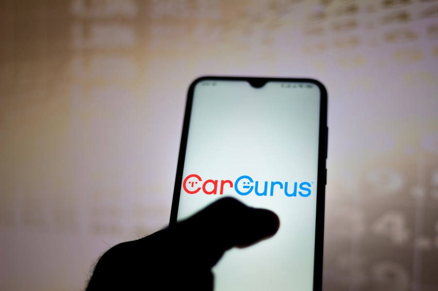 CarGurus logo displayed on a phone