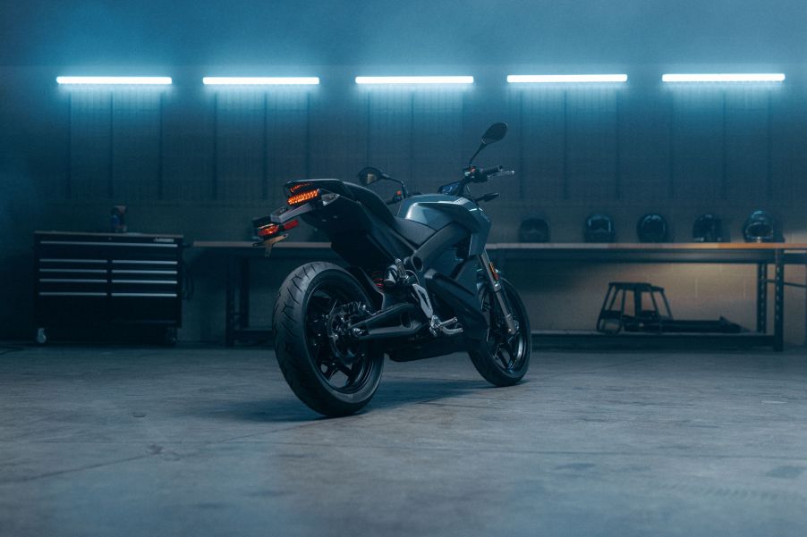 The rear 3/4 view of a dark-blue 2022 Zero S in a garage