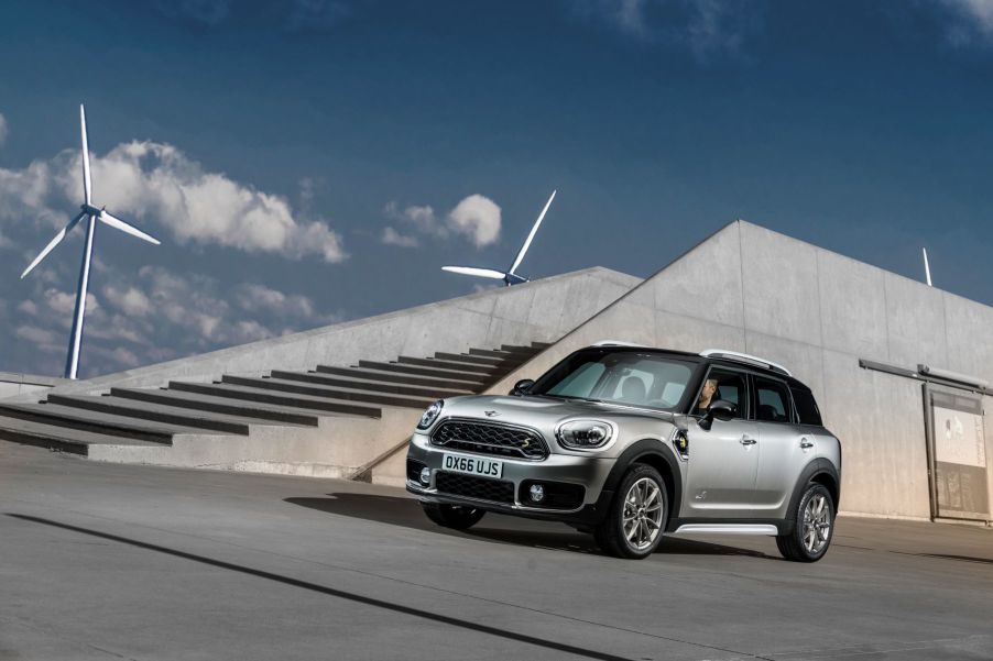 The Mini Cooper SE Countryman PHEV model parked near windmills