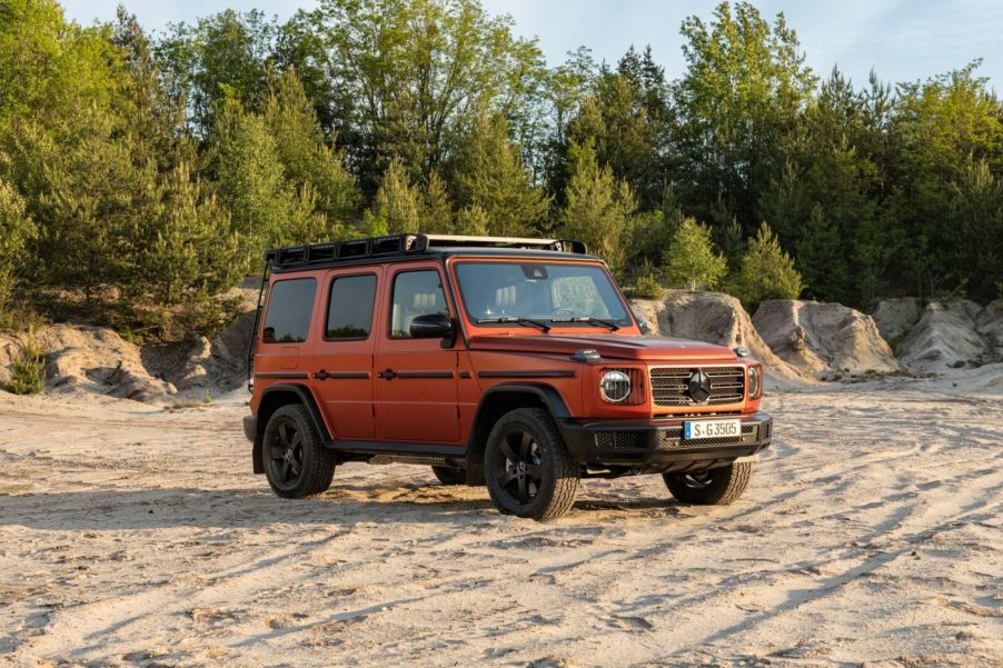 Passenger's side front angle view of orange Mercedes-Benz G-Class Professional Line Exterior