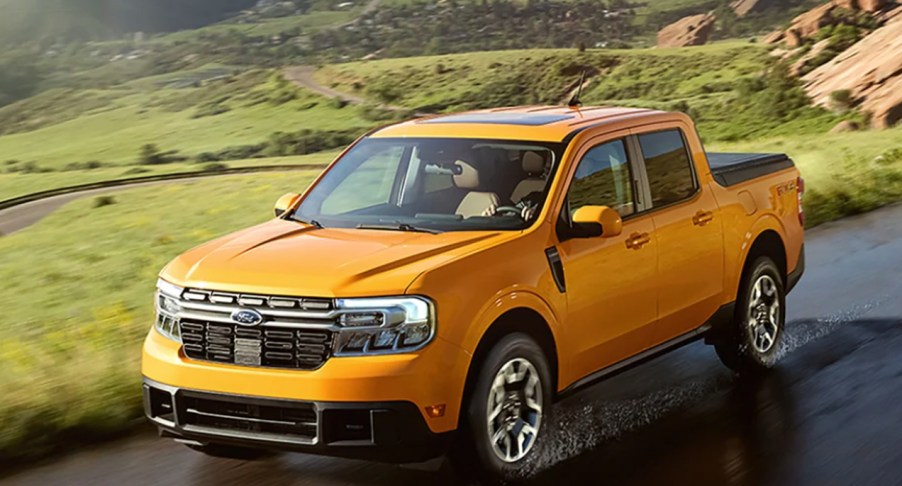 Yellow Ford Maverick driving on the road