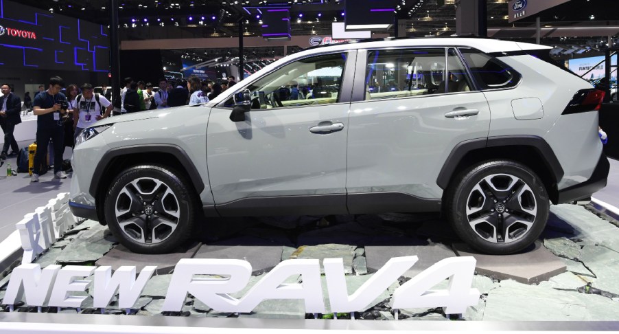 A Toyota Rav4 is displayed on the opening day of the Shanghai Auto Show in Shanghai on April 16, 2019. - Global car makers flock to the Shanghai Auto Show this week with the world's largest vehicle market facing an unfamiliar sales slump just as China veers toward an ultra-competitive electric future.