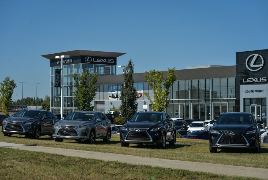 New Lexus vehicles parked outside a Lexus dealership