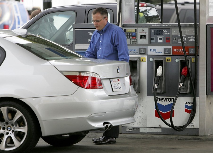 A customer pumps premium gas into a BMW at a Chevron station in April 2006 in San Francisco