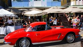 A 1962 Chevy Corvette at a classic and antique car show