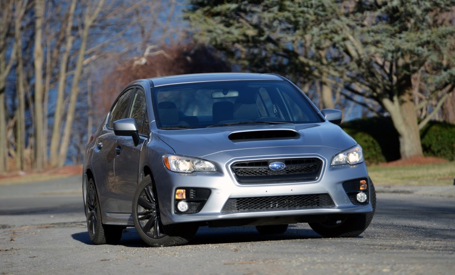 A silver Subaru WRX sedan, the perfect car for winter 2021, shot from the front on a winter day