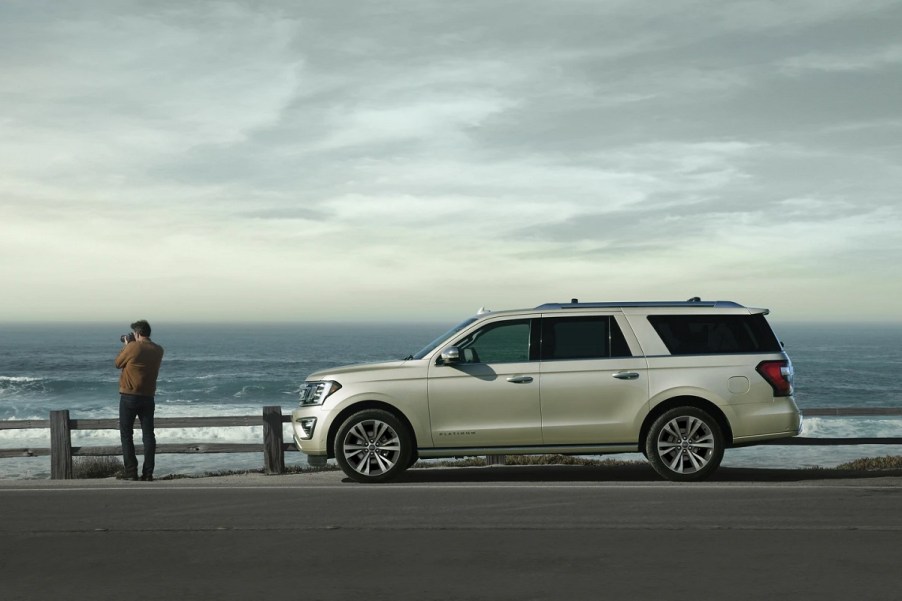 A beige 2021 Ford Expedition parked at the beach.