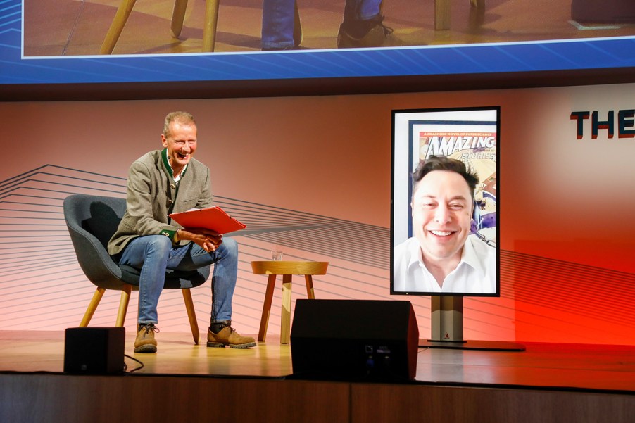 Elon Musk calling into a meeting with VW executives via video to discuss Volkswagen EV production