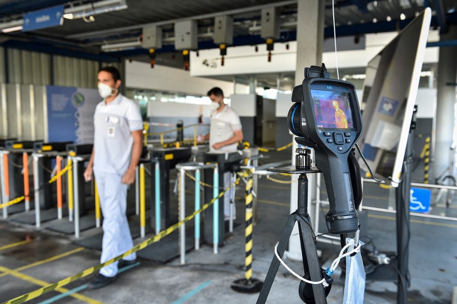 An FCA factory checking the temperatures of employees as they enter the facility. Ford, General Motors, and Stellantis all announced that they would enact a vaccine mandate in their Canadian facilities starting this year.