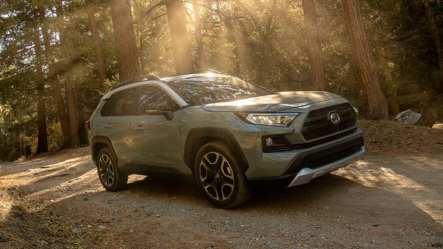 Lunar Rock 2022 Toyota RAV4 driving through a forest