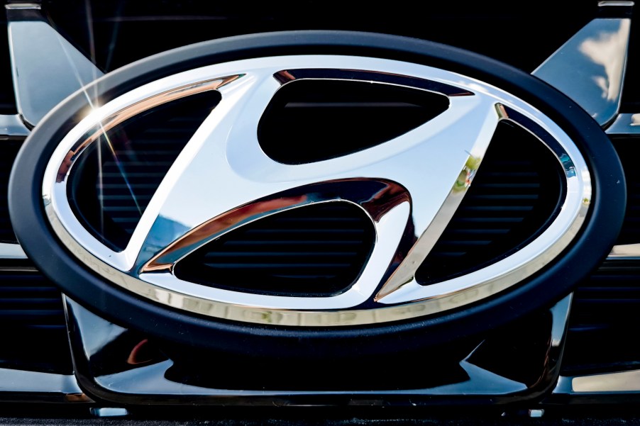 A chrome Hyundai logo on a black grille.