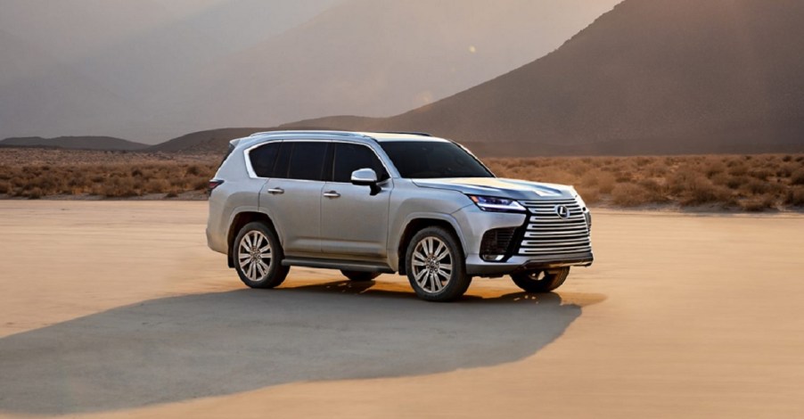 A silver 2022 Lexus LX 600 sitting in a desert.