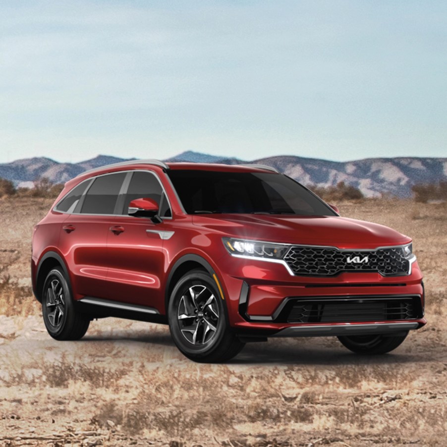 A red 2022 Kia Sorento parked on the plain.