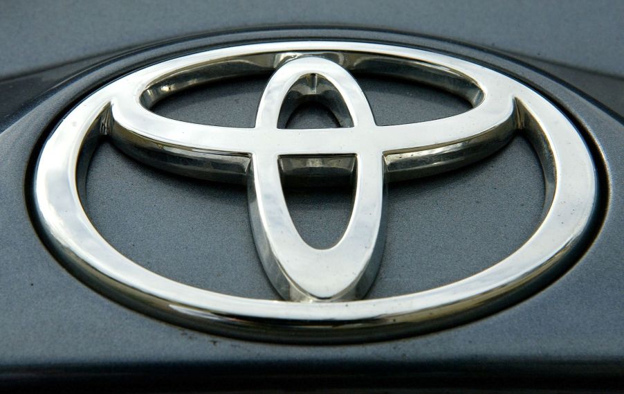 Toyota logo on a black background as found on a Toyota Land Cruiser.