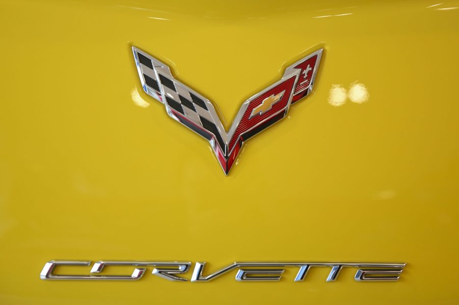 The Corvette badge on a yellow Chevrolet Corvette