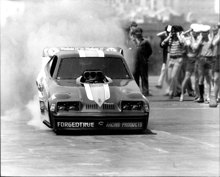 1979 Oldsmobile Starfire funny car doing a burnout on an aircraft carrier