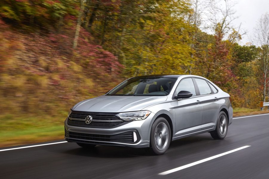 The new Volkswagen Jetta shot from the front 3/4 on a fall road