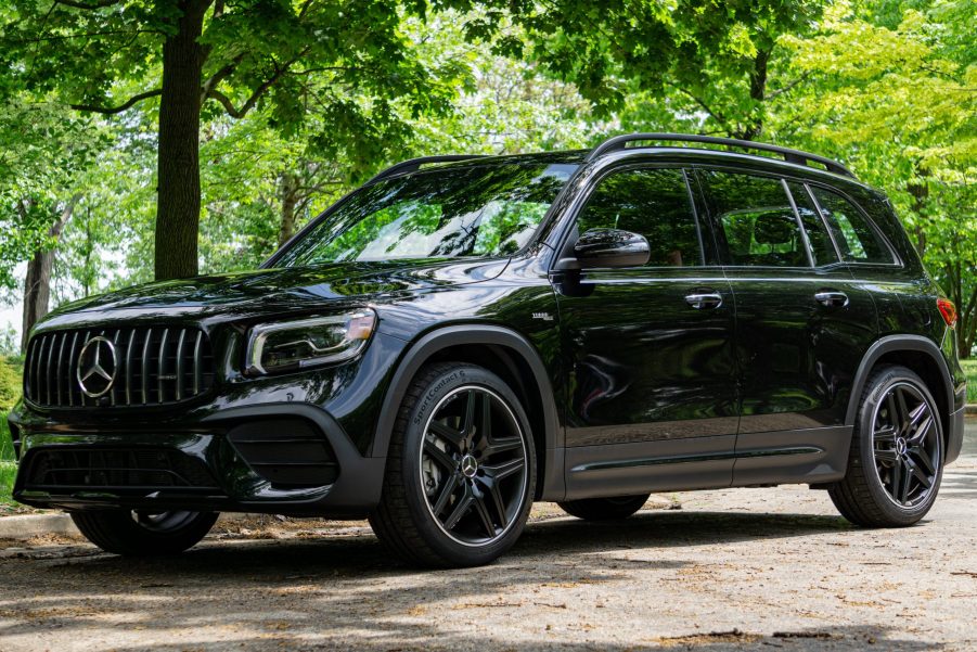 A black 2021 Mercedes-AMG GLB 35 in a forest parking lot