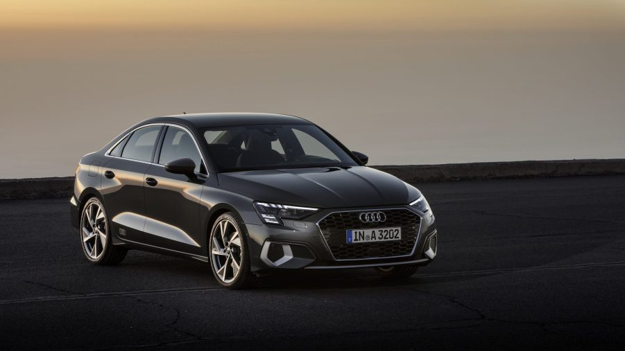 A grey 2022 Audi A3 luxury car shot from the 3/4 angle at sunset