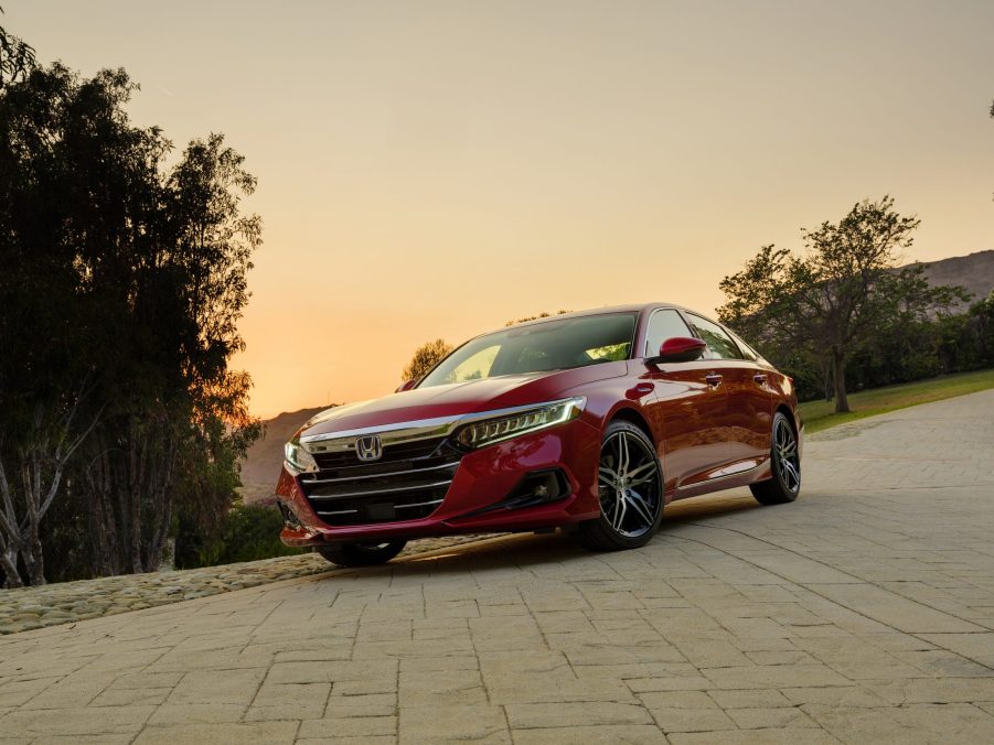 A red 2022 Honda Accord shot at sunset