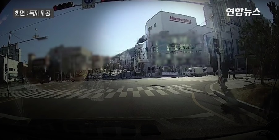 This car accident involved a taxi driving through the wall of a parking garage