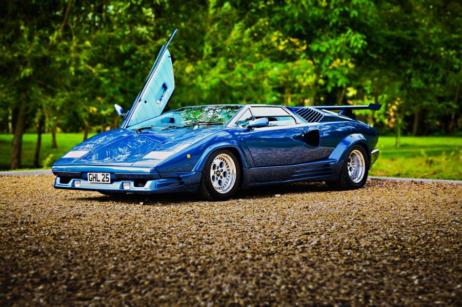 A blue Lamborghini Countach supercar shot from the front 3/4