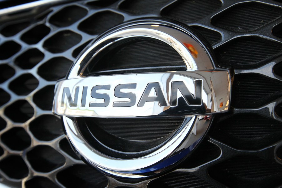 A badge from a Nissan vehicle.