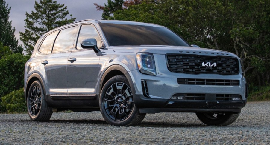 A gray 2022 Kia Telluride midsize SUV is parked.