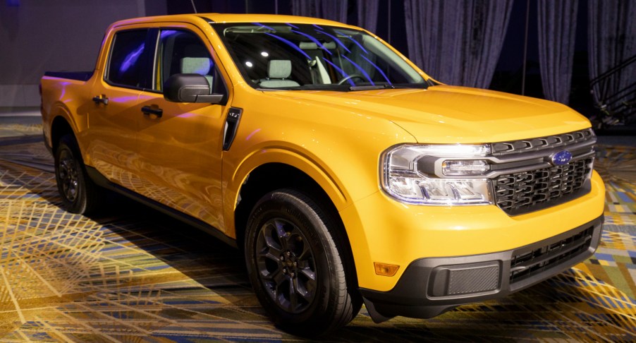 A yellow 2022 Ford Maverick is on display.