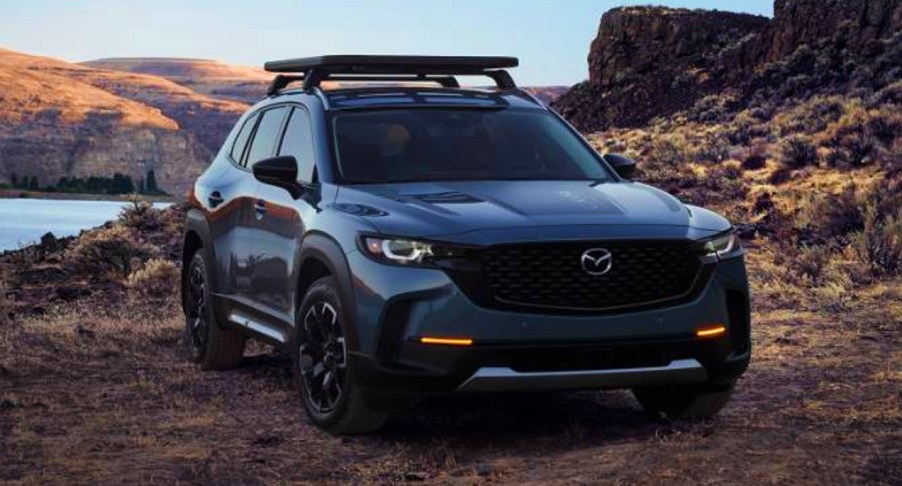 A blue 2023 Mazda CX-50 small SUV is parked outdoors.