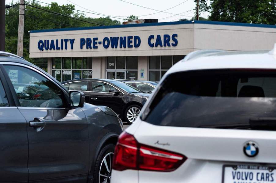 A close up of used cars for sale on a lot.