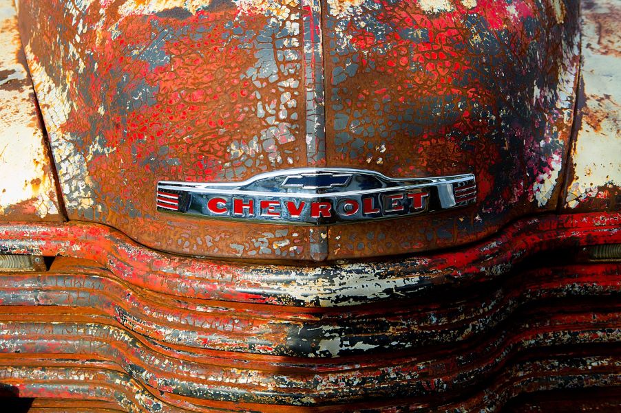 A rusted 1950's Chevrolet truck at the Goodwood Revival Meeting