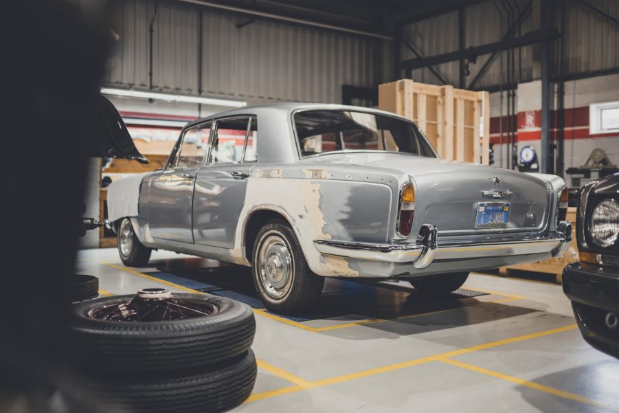 The rear 3/4 view of the first 1965 Bentley T Series undergoing restoration