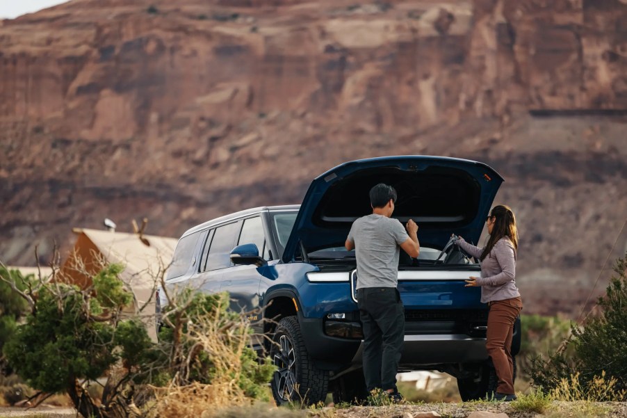 Rivian R1S owners using its frunk. Battery power and charging times are great for the electric SUV.