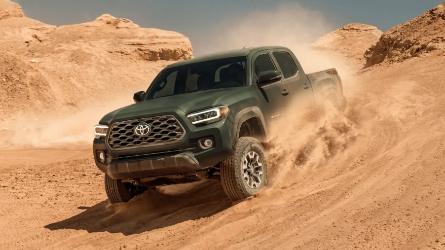 Toyota Tacoma driving through the sand