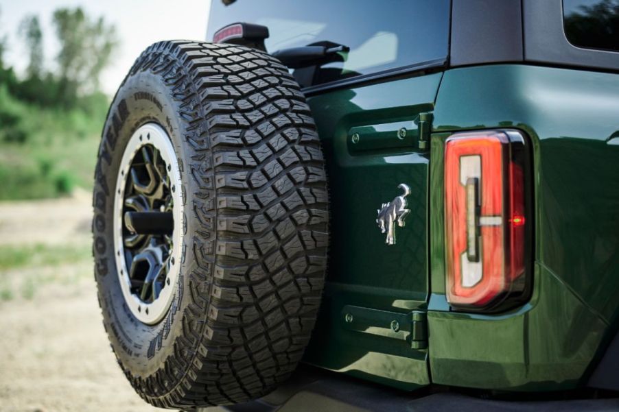 A green 2022 Ford Bronco on display.