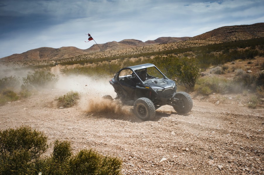 2022 Polaris RZR Pro R driving through the desert, up close view