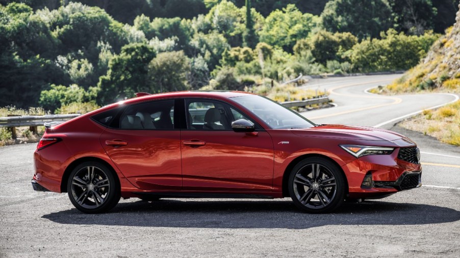 a red 2023 acura integra a-spec parked, the last all-new acura with a gas engine