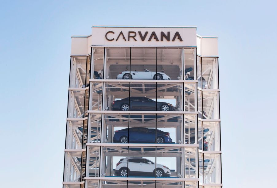 Caravan building with cars inside.