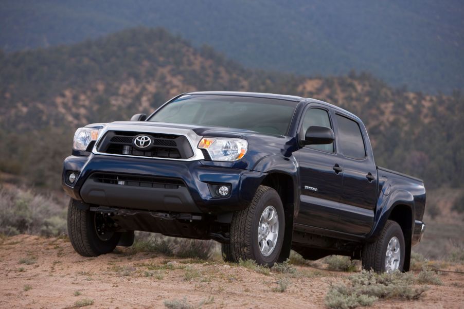 A Toyota Tundra on top of a dusty hill. Models from 2012-15 are among the worst Toyota Tundra models.