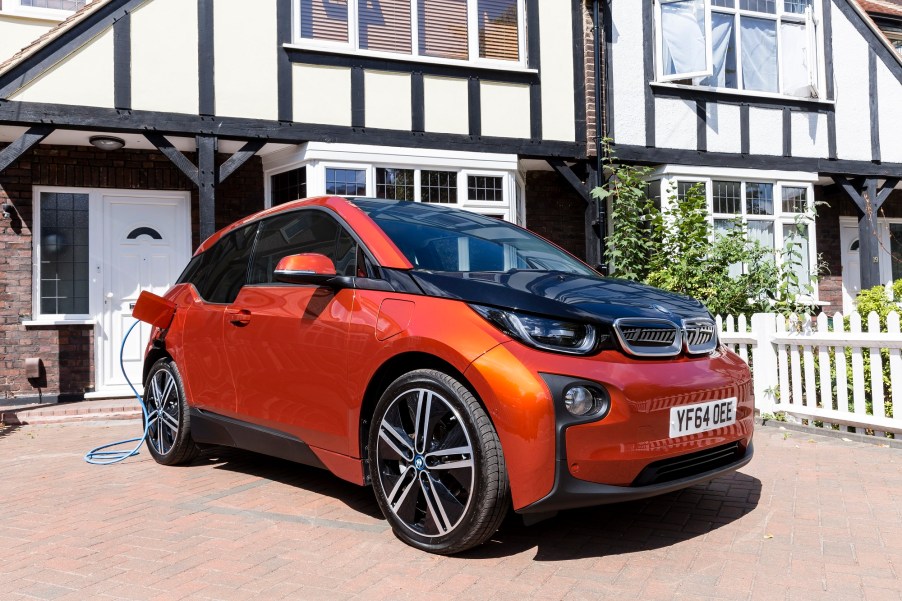 The BMW i3 REx, here in orange and black, is a plug-in hybrid with advantages over other vehicles.