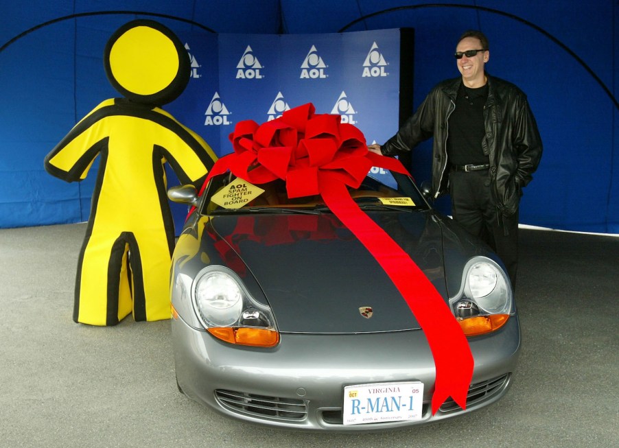 AOL CEO hosting a give-away of a Porsche sports car.