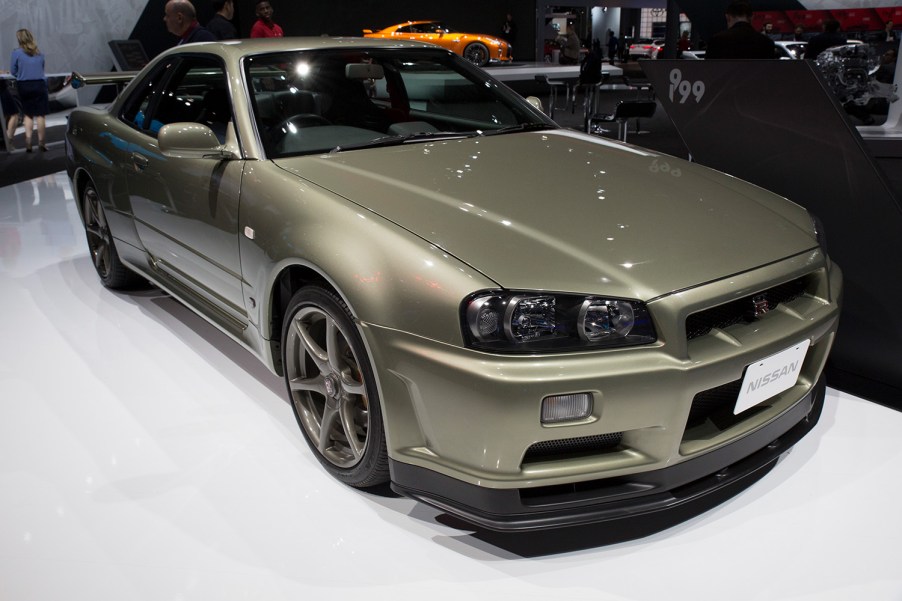 R34 Nissan Skyline M Spec Nur Show and Display Legal Millenium Jade parked at Tokyo Auto Salon