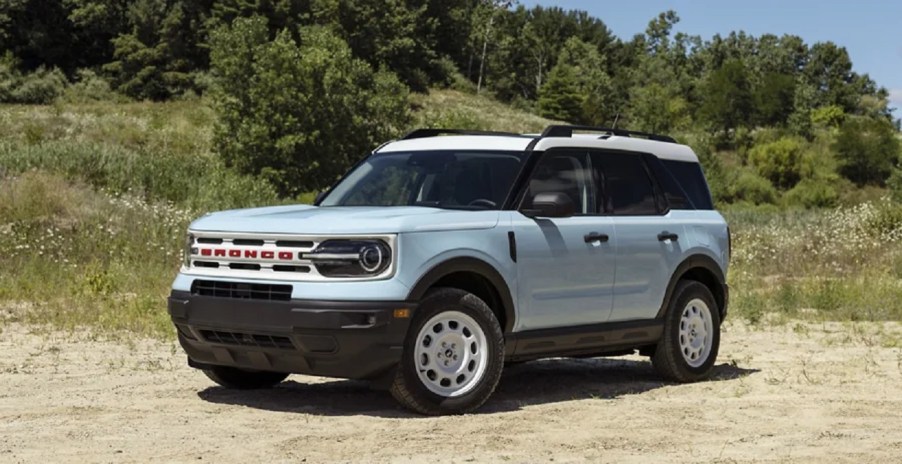 An ice blue 2022 Ford Bronco Sport driving in the desert.