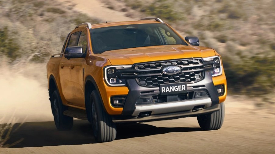 Front angle view of Cyber Orange 2024 Ford Ranger midsize pickup truck