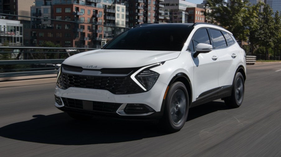 Front angle view of white 2023 Kia Sportage