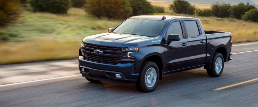 a black 2021 Chevy Silverado in black on a road